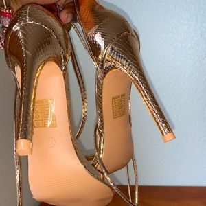 Gold strap up heels